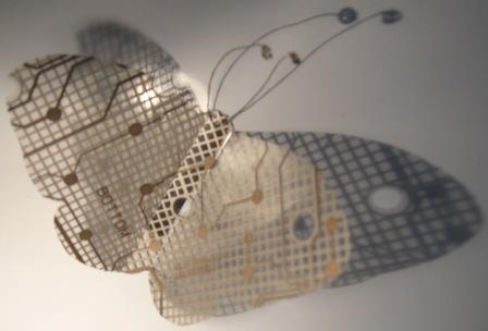 Butterfly magnets made from computer keyboard matrix and usb cables